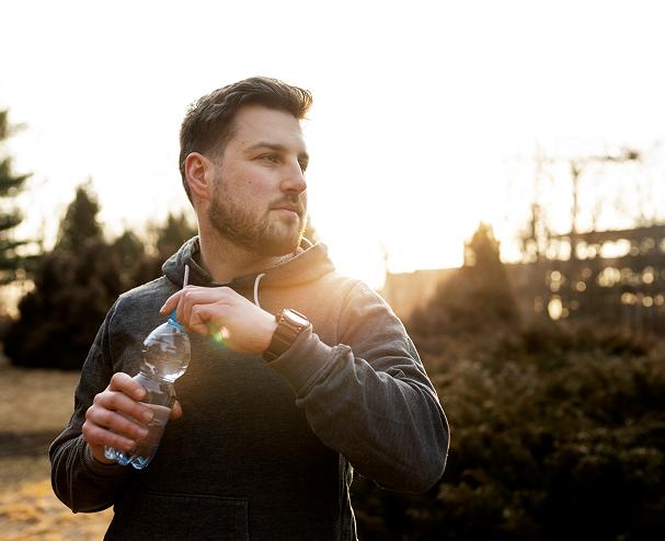 man with water bottle